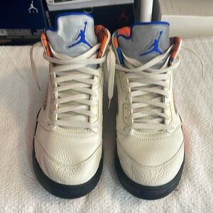 A gentle used pair of Jordan 5